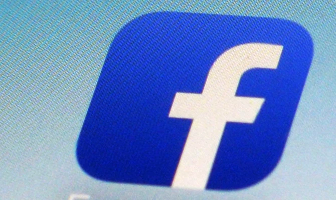 This Feb. 19, 2014, file photo, shows a Facebook app icon on a smartphone in New York. (AP)