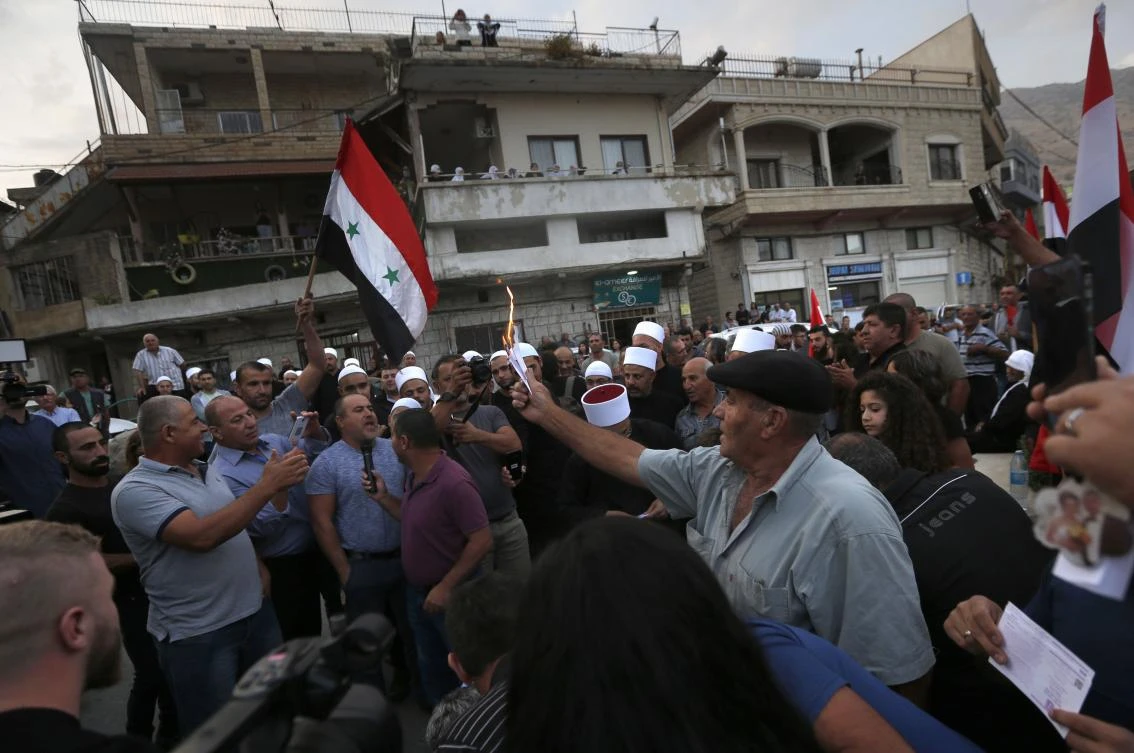 Druze residents of the Golan will for the first time join millions of Israelis voting in local elections next week. (AFP)
