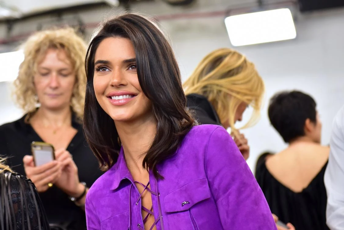 Kendall Jenner sports a L’Afshar bag courtside in LA
