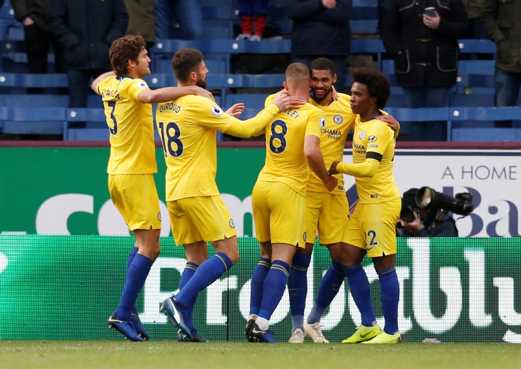 Chelsea's Ruben Loftus-Cheek celebrates scoring their fourth goal with Ross Barkley and team mates. (Action Images via Reuters)