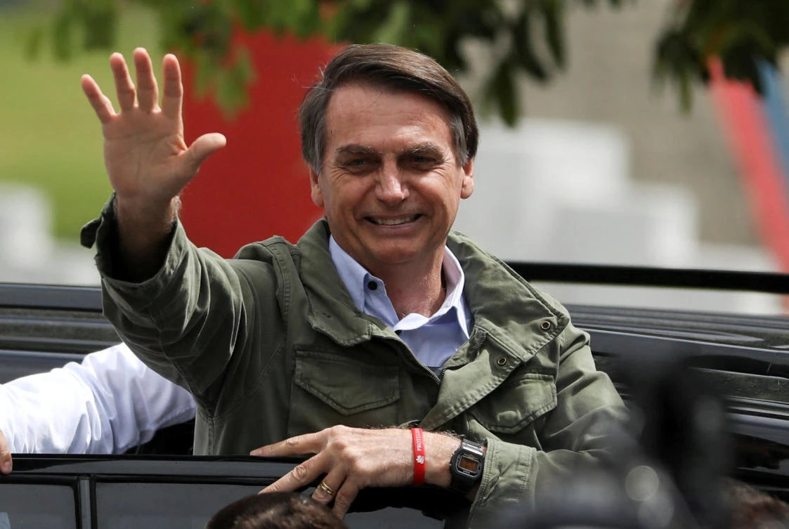 Jair Bolsonaro, far-right lawmaker and presidential candidate of the Social Liberal Party (PSL), gestures at a polling station in Rio de Janeiro, Brazil October 28, 2018. (Reuters)