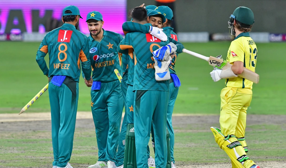 Pakistan’s cricketers celebrate at the end of the third T20 cricket match between Pakistan and Australia at The International Cricket Stadium in Dubai on October 28, 2018. (AFP)