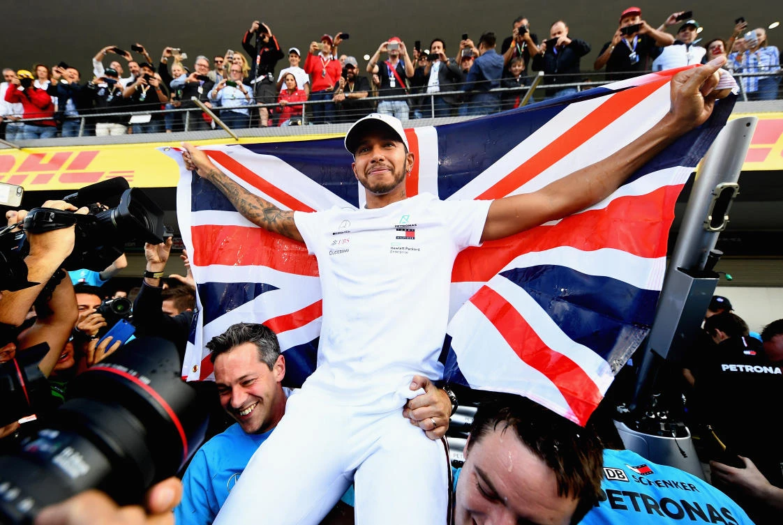 A familiar feeling for Hamilton who celebrated his fifth world title on Sunday. (AFP)