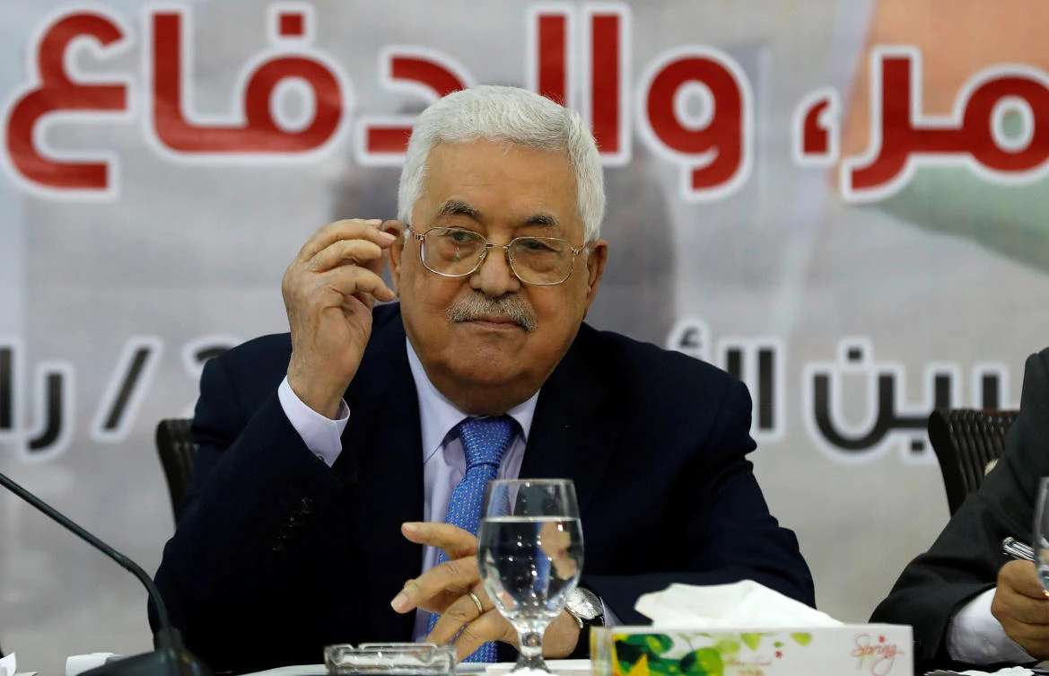 Implementation is still up to Palestinian President Mahmoud Abbas. (Reuters)