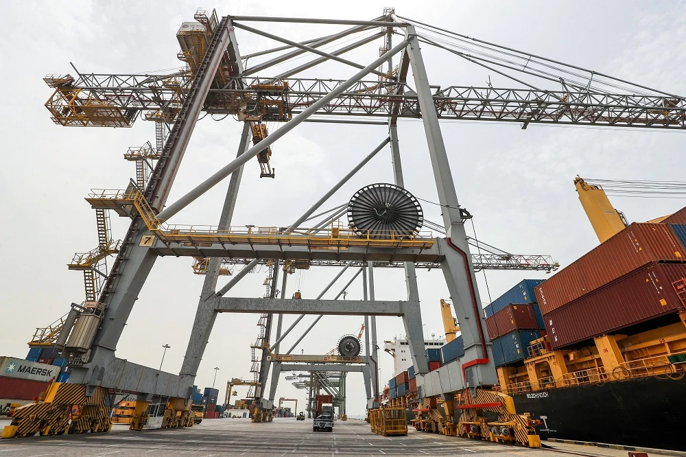 A picture taken on August 9, 2018 during a trip in Yemen organised by the UAE's National Media Council (NMC) shows a view of the container cranes at the docks in the port of Aden. (File/AFP)