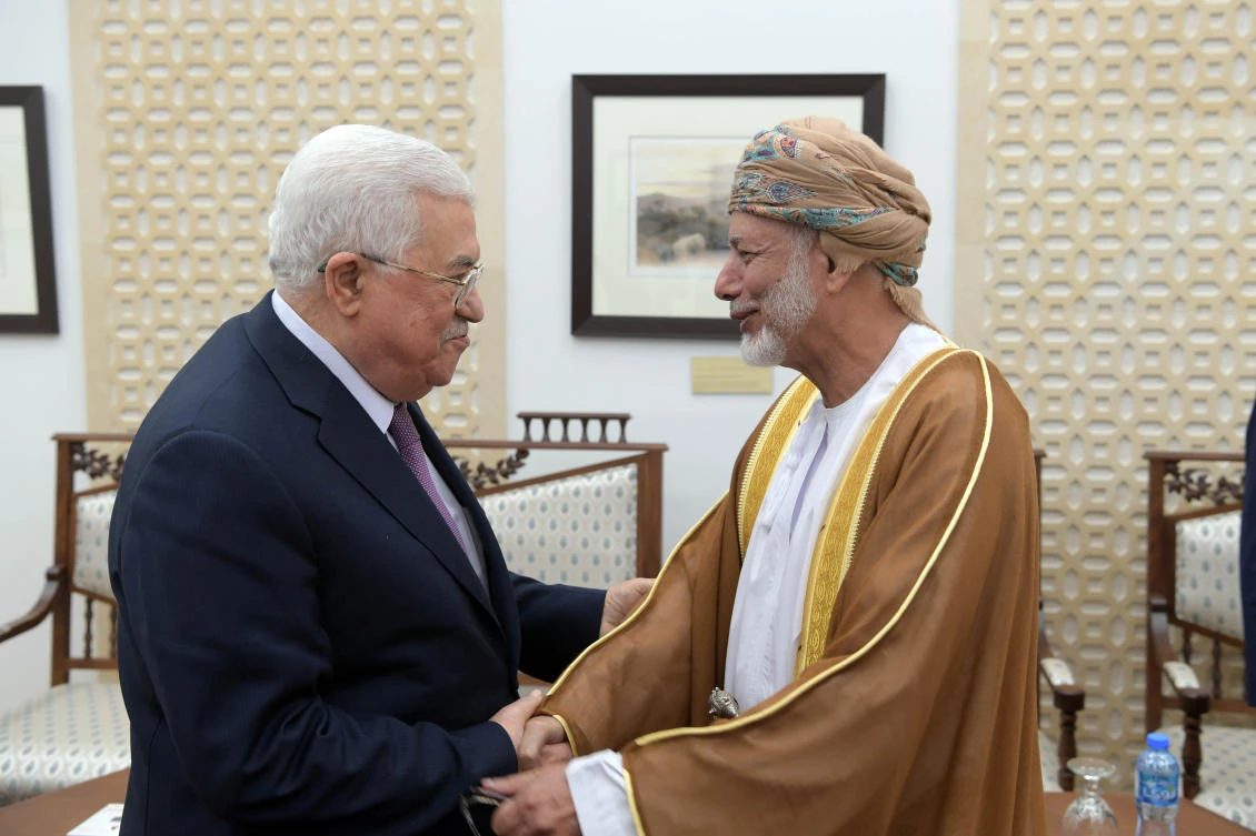 A handout picture released by the Palestinian Authority's Press office (PPO) shows Palestinian president Mahmud Abbas during his meeting on October 31, 2018 with Omani minister responsible for foreign affairs, Yussef bin Alawi bin Abdullah, in the West Bank city of Ramallah. (AFP)