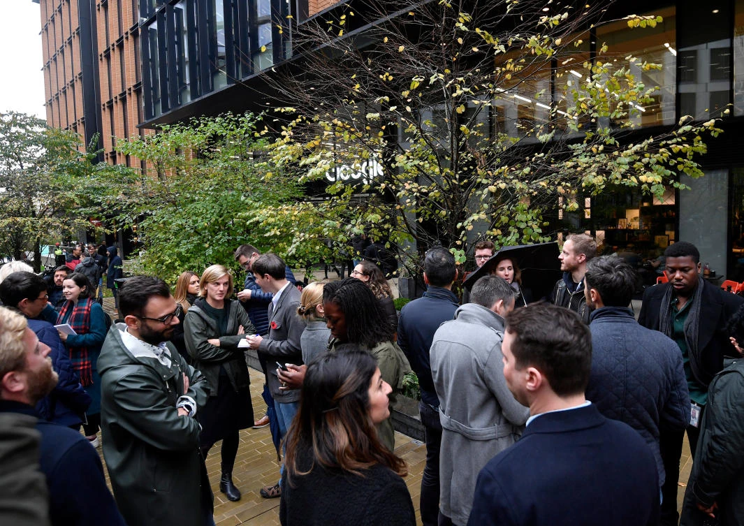 Workers stand outside the Google offices in London after walking out as part of a global protest over workplace issues. (Reuters)