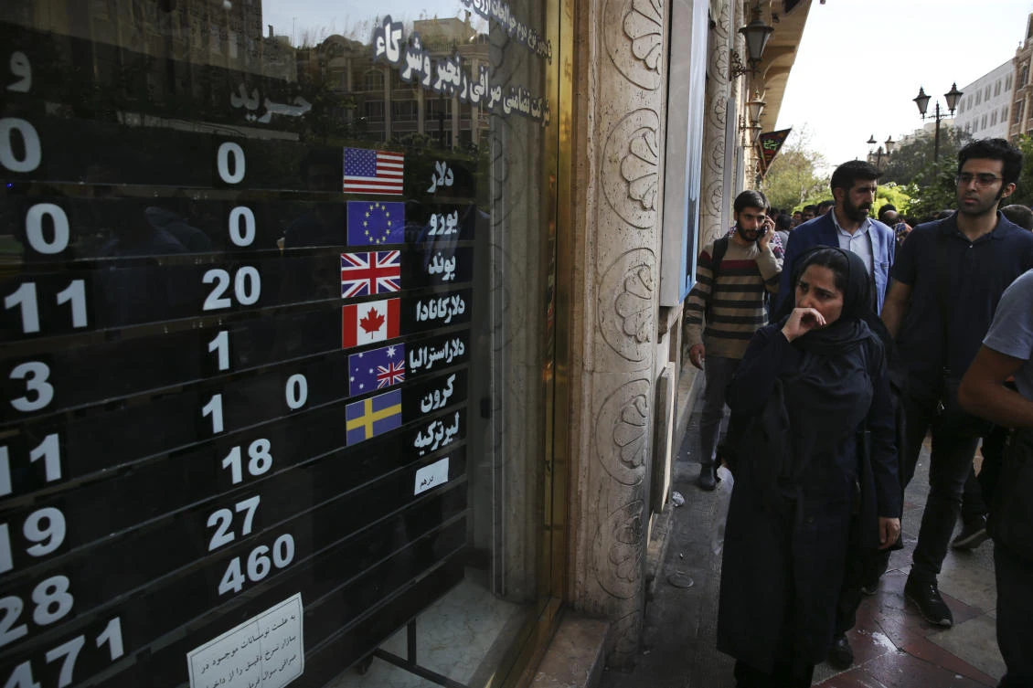 The renewed sanctions have already taken a heavy toll, with the rial losing half its value since April. (AP)