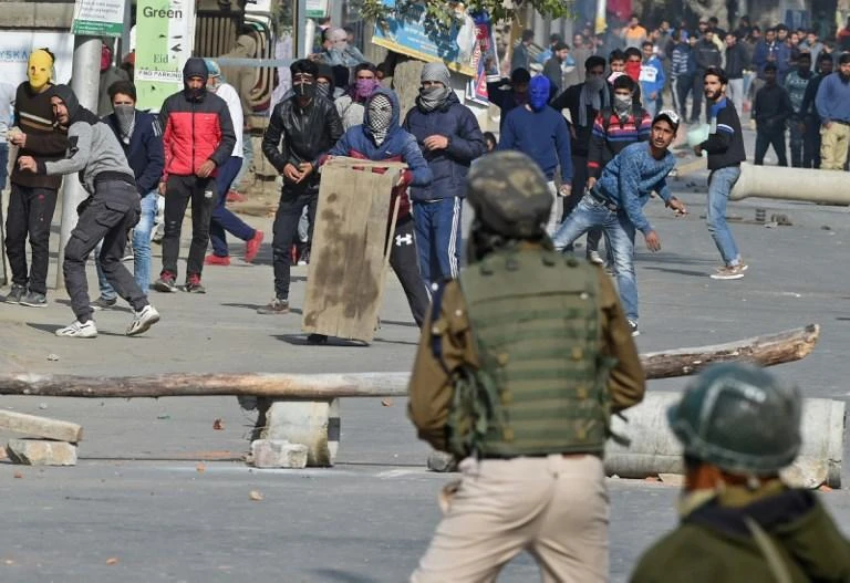 Kashmiri protesters clash with Indian security forces on the outskirts of Srinagar. (AFP)