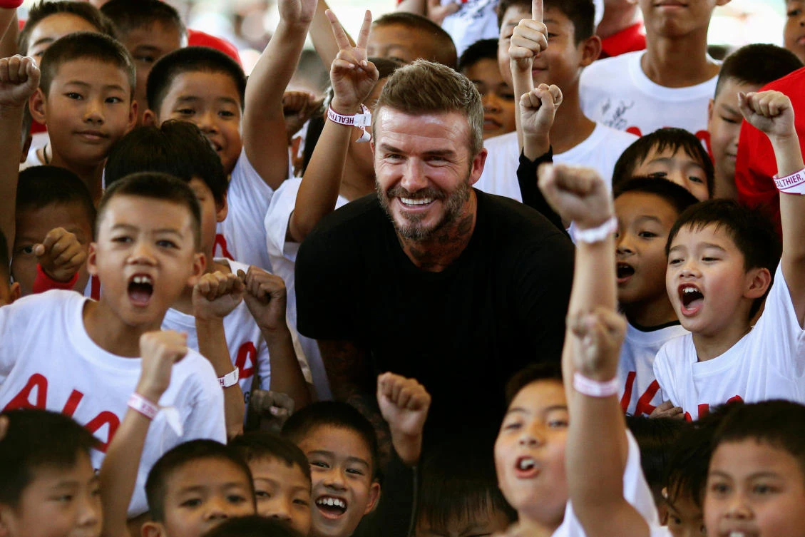 Beckham adds star power to Thai soccer clinic