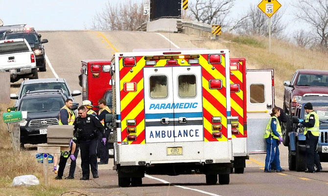 Emergency medical personnel gather at the scene of a hit-and-run accident Saturday, Nov. 3, 2018, in Lake Hallie, Wis., that killed two girls and an adult. (AP)