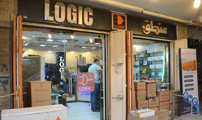 A photo taken on October 14, 2018 shows an electric appliance store in Mosul. Since militants were ousted from Mosul last year, taxi driver Abu Aref has ferried more than just people into Iraq's second city: he regularly smuggles envelopes stuffed with cash. (AFP)