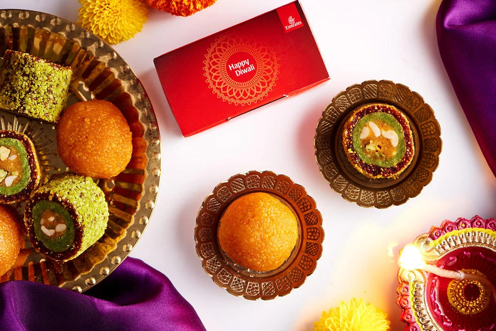 During the festival week, Emirates customers in economy class can enjoy gram flour-based motichoor laddu served with all meals.