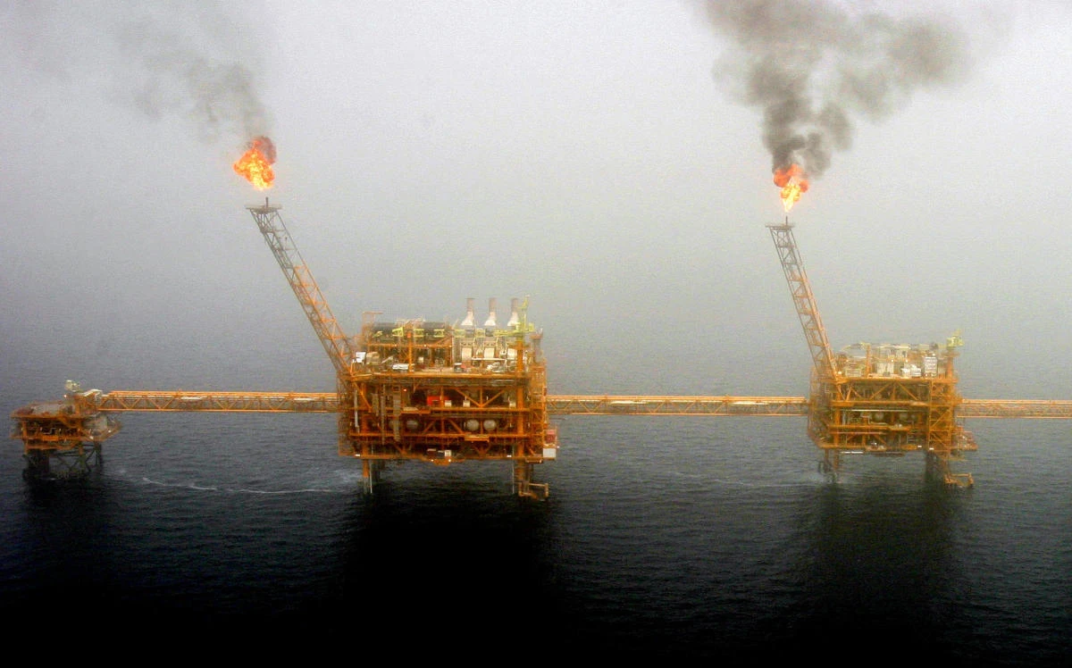 Oil markets have been preparing for the US sanctions on Iran for months. Above, gas flares from an oil production platform at the Soroush oil fields in the Arabian Gulf, south of Tehran. (Reuters)