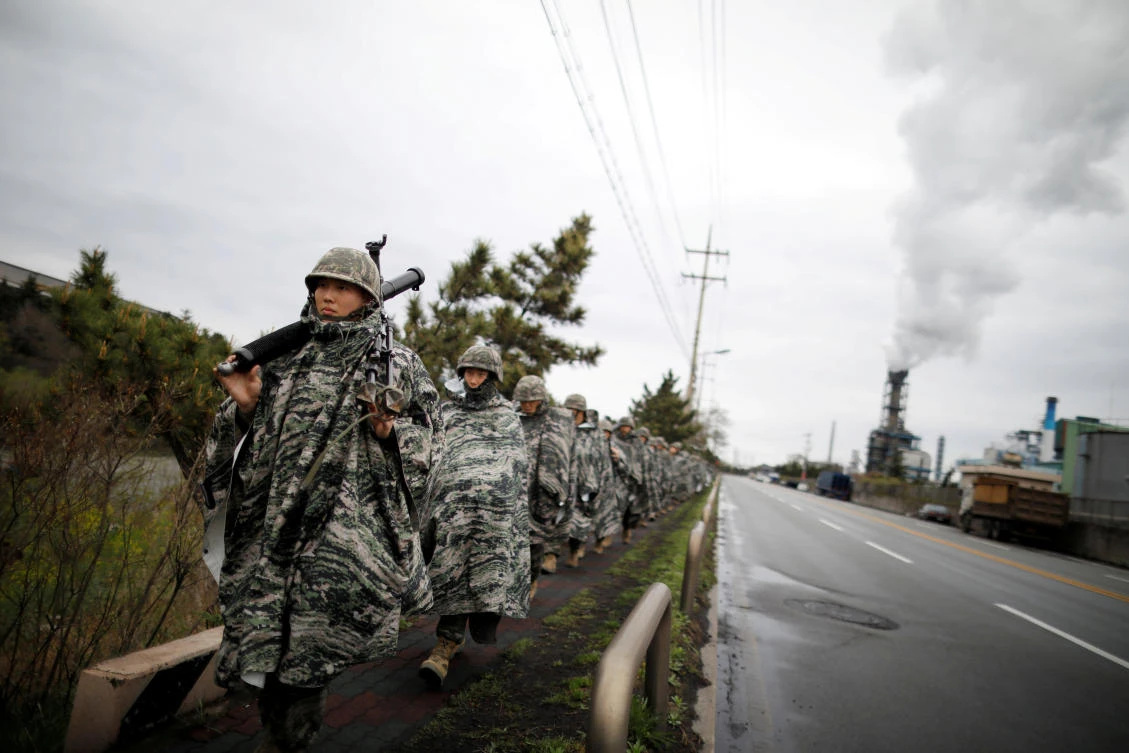 South Korean marines march during a military exercise as a part of the annual joint military training called Foal Eagle between South Korea and the US in Pohang on April 5. (Reuters)