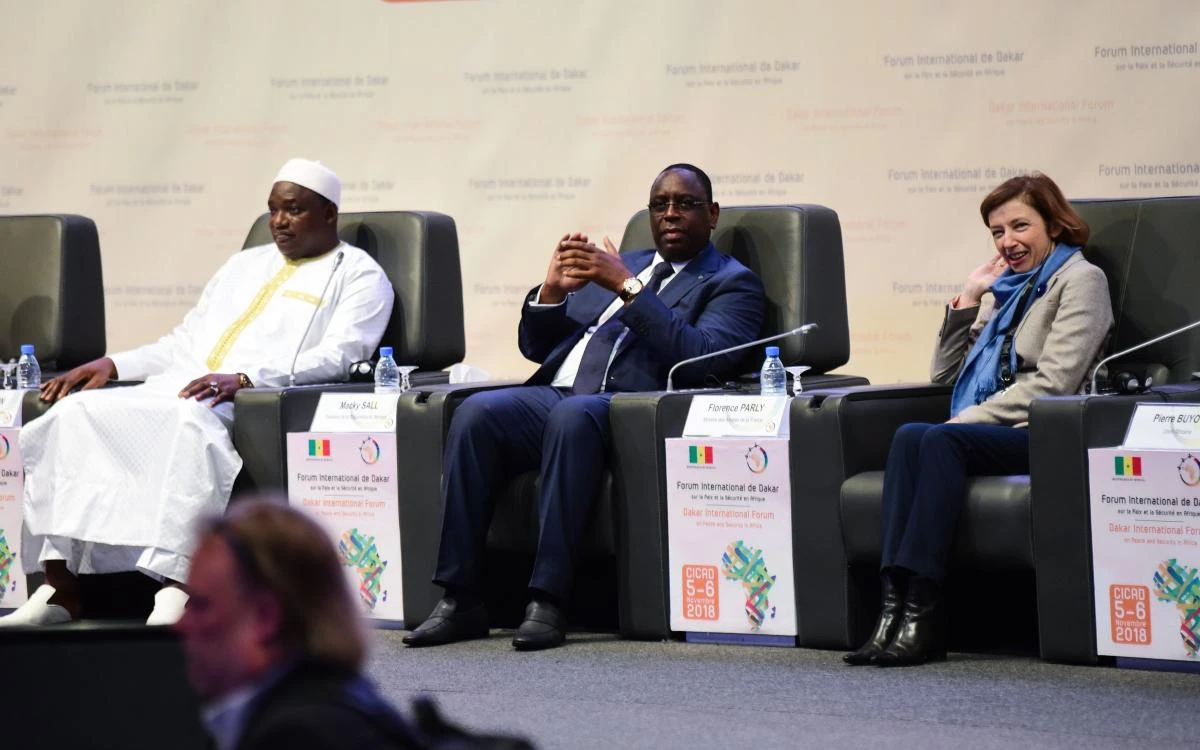 (From L) Gambia’s President Adam Barrow, Senegal’s President Macky Sall and French Defense Minister Florence Parly sit on stage as they attend the opening ceremony for the 5th edition of the African security forum, in Diamniadio, on the outskirts of Dakar, on November 5, 2018. (AFP)