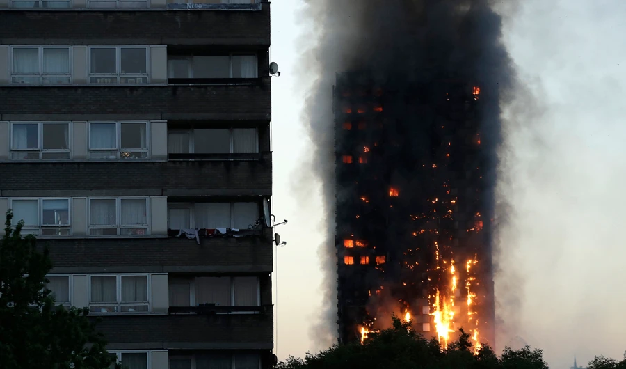UK police arrest six men over burning of Grenfell Tower effigy