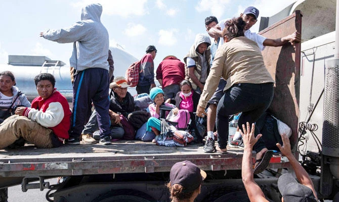 Migrants in caravan shrug over US vote, eye change at home