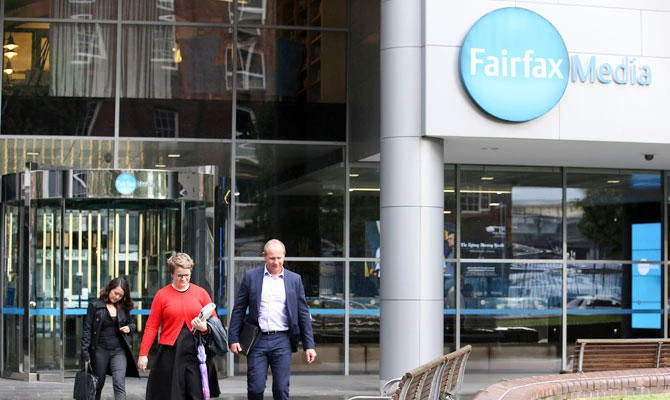 In this May 3, 2017, file photo, people leave the Farifax offices in Sydney, Australia. (AP)