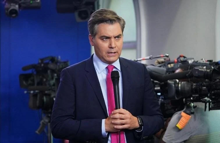 White House bars CNN reporter after heated Trump exchange