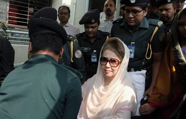 Bangladesh’s main opposition leader and Bangladesh Nationalist Party chairperson Khaleda Zia, center, looks on as she is escorted back to prison from a hospital visit on Thursday, November 8. (AFP)