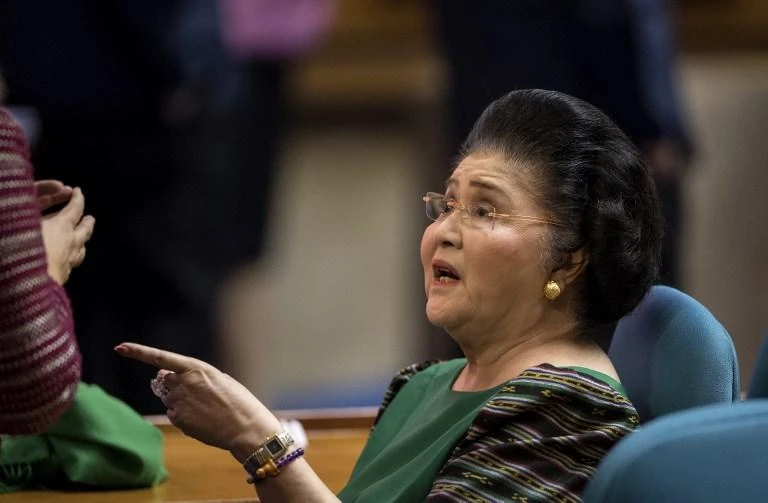 Former Philippine first lady Imelda Marcos convicted of graft, arrest ordered