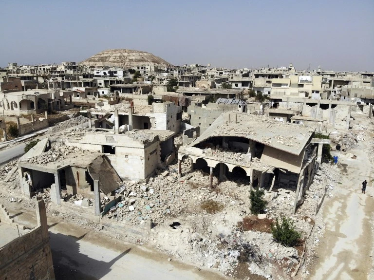 Fighting erupted when government troops seized a position in a rural area in the north of neighboring Hama province, above. (AFP)