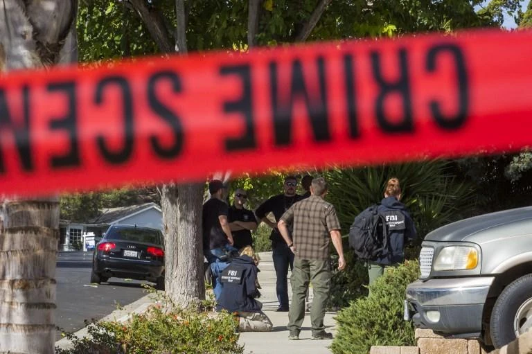 FBI agents collect evidence at the home of suspected country music bar shooter Ian David Long in Thousand Oaks, northwest of Los Angeles. (AFP)