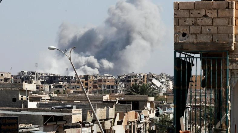 US-led coalition air strikes killed 26 civilians including 14 children Friday in a holdout of Daesh in eastern Syria. (Reuters)