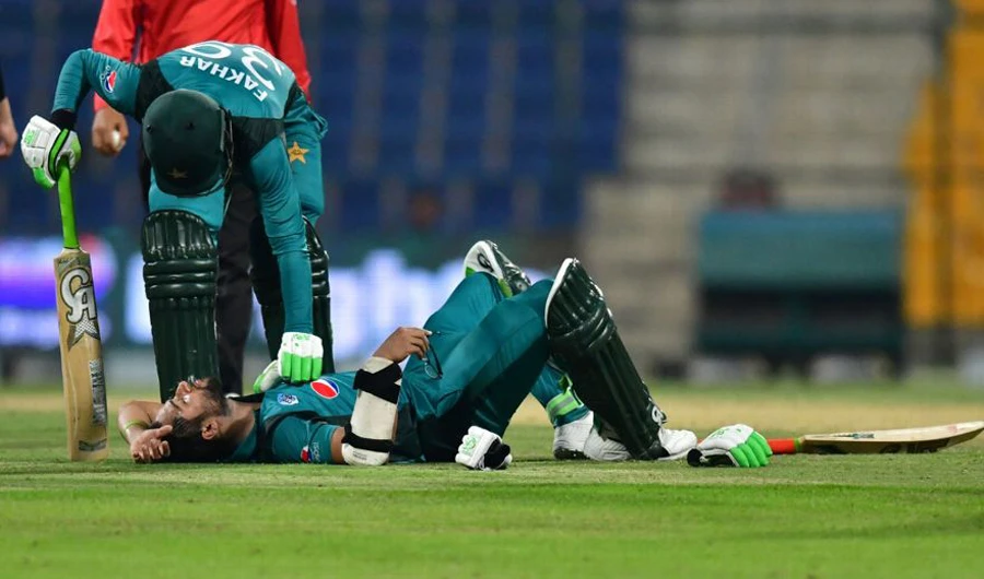 Pakistani batsman Imam-ul-Haq can be seen on the ground after being hit by a bouncer. (AFP)