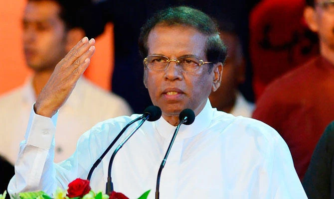 In this photo taken on November 5, 2018, Sri Lanka's President Maithripala Sirisena gestures as he addresses supporters at a rally in Colombo. (AFP)