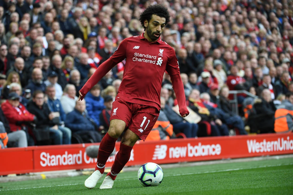 Mohamed Salah capitalized on some quick thinking by Liverpool to maintain his impressive scoring record at Anfield in a 2-0 win over back-markers Fulham. (AFP)