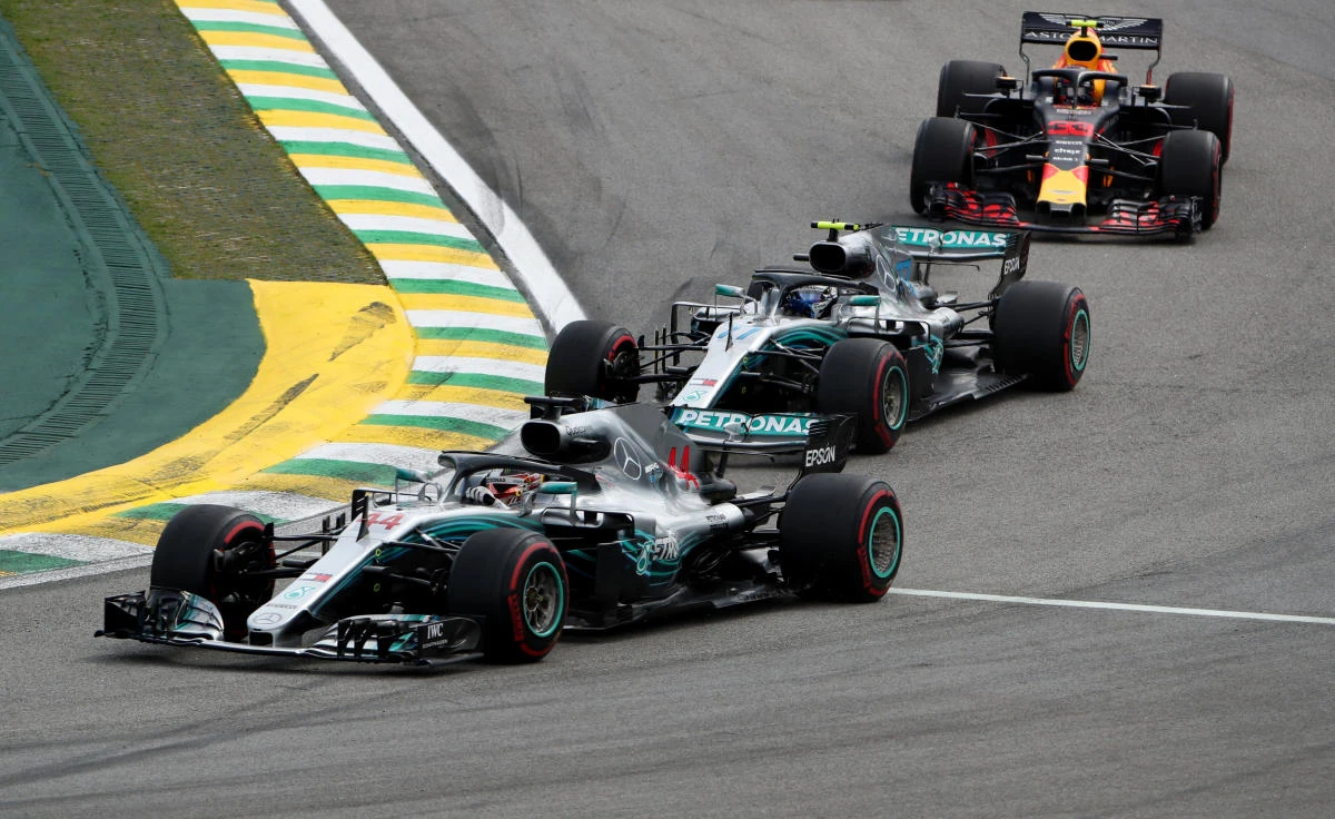 Mercedes' Lewis Hamilton leads at the start of the race ahead of Valtteri Bottas and Red Bull's Max Verstappen. (Reuters)