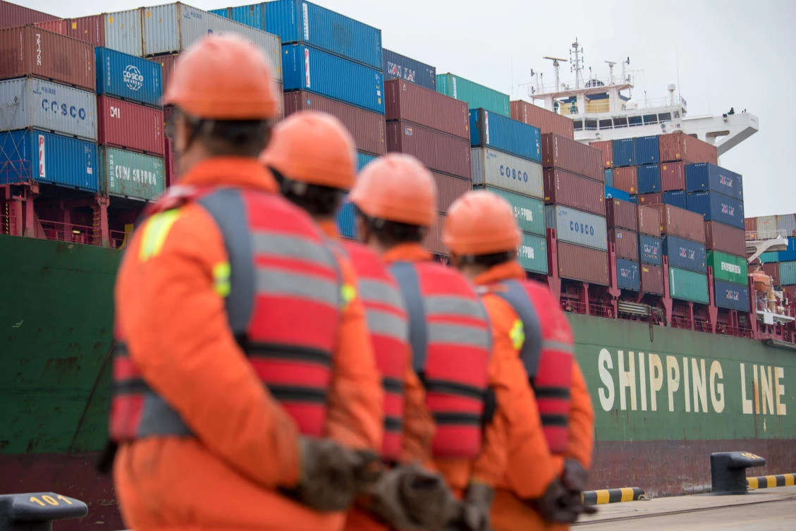 ‘China has opened its door to the world; we will never close it but open it even wider,’ Chinese Premier Li Keqiang said in a published article. (Reuters)
