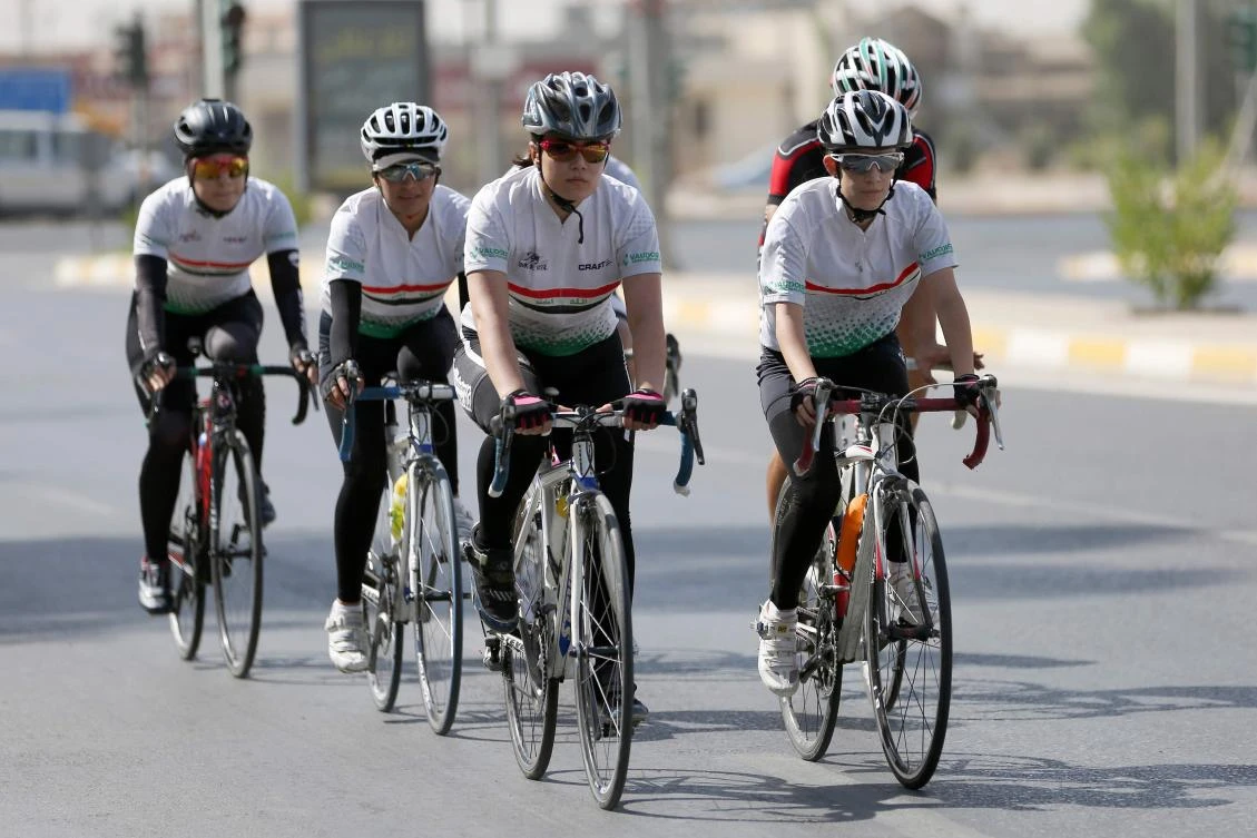 Members of the Iraqi national cycling women's team take part in a training camp on August 14, 2018, in Erbil, the capital of the autonomous Kurdish region, ahead of the "Arab Cycling Champions in Algeria". (AFP)
