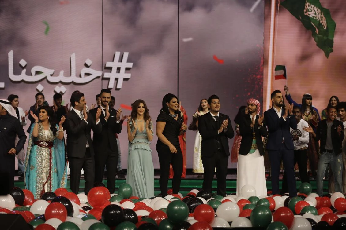 The jury of the TV show “Arab Idol” take part in a tribute for the Kuwaiti National Day last year. (AFP)