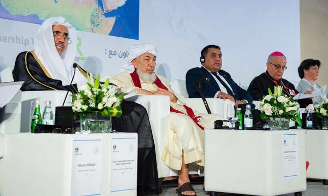 Dr. Mohammed bin Abdulkarim Al-Issa, secretary-general of the Muslim World League (MWL), speaks at the Wilton Park Inclusive Citizenship Dialogues forum in Abu Dhabi on Tuesday. (SPA)