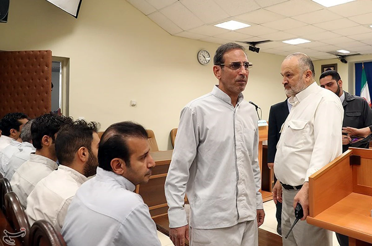 Vahid Mazloumin appears in court for the first time on charges of manipulating the currency market. (Tasnim News Agency/Reuters)