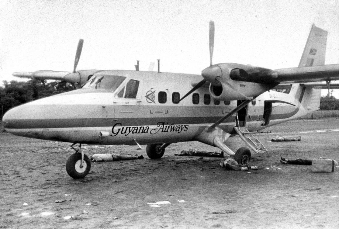 The bodies of five people, including Rep. Leo J. Ryan, D-Calif., lie on the airstrip at Port Kaituma, Guyana, after an ambush by members of the Peoples Temple cult. (AP Photo)