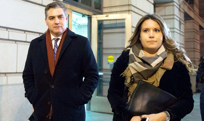 CNN White House correspondent Jim Acosta (L) leaves US District Court after a hearing in Washington, DC, on November 14, 2018. (AFP)