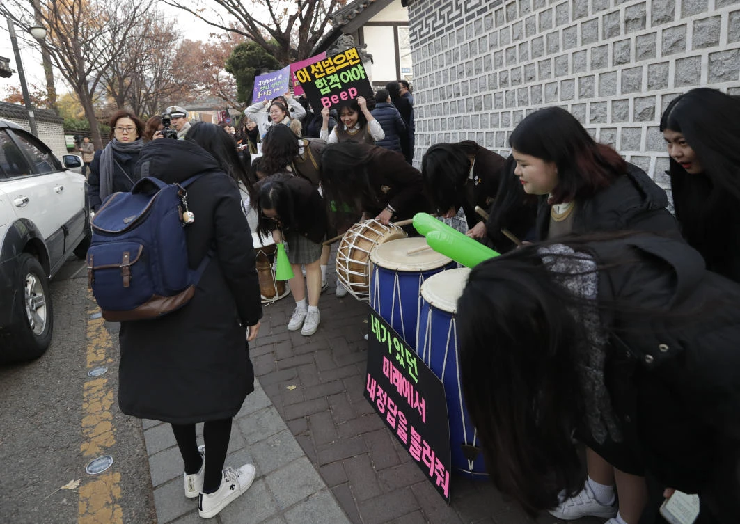 This year nearly 595,000 students are sitting the grueling national university entrance exam, which stretches over nine hours. (AP)