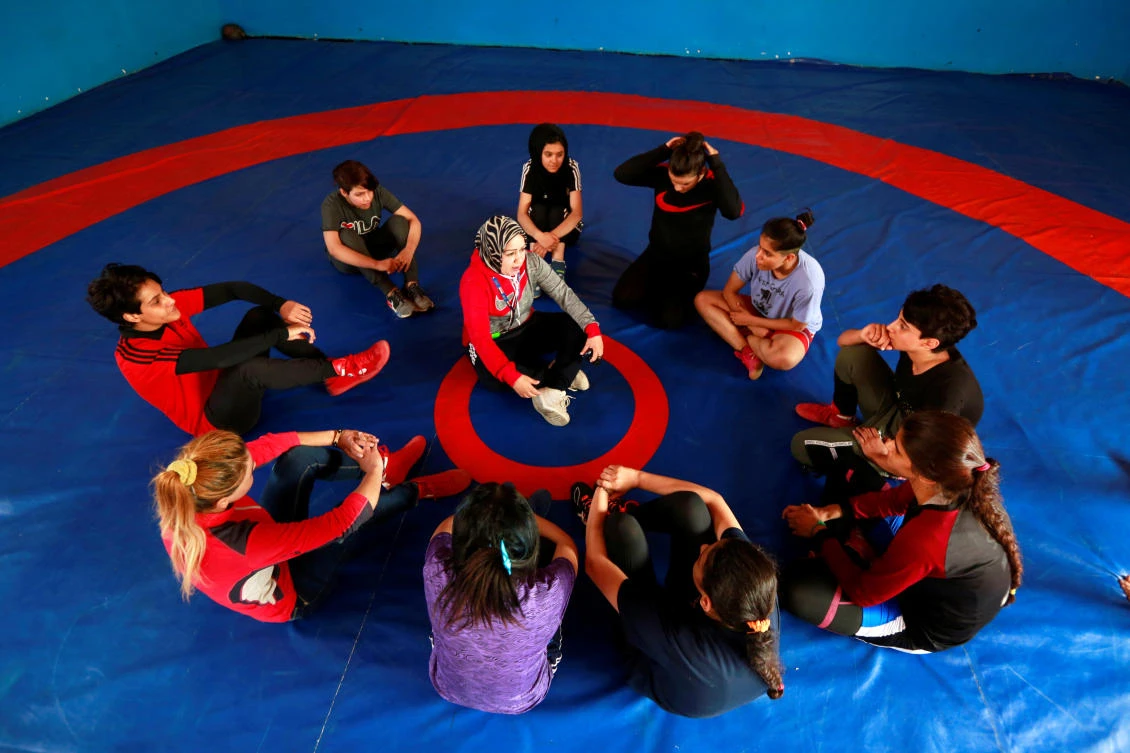 Grappling with taboos, Iraqi women join wrestling squad