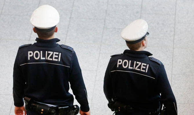 German police officers patrol in a terminal at the airport in Frankfurt, Germany, Monday, Jan. 19, 2015. (AP)