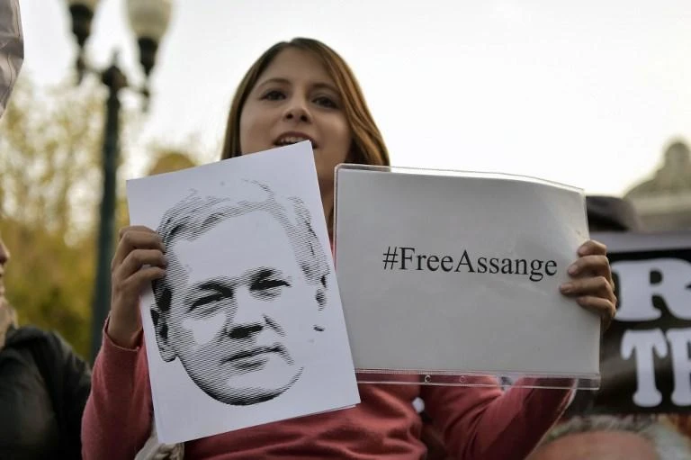 Protesters in Quito show their support to WikiLeaks founder Julian Assange during a demonstration on October 31. (AFP)