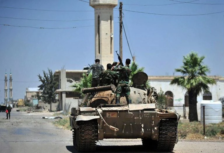 Extremists on Friday killed nine Syrian regime fighters near a planned buffer zone around the country’s last major rebel bastion. (AFP)