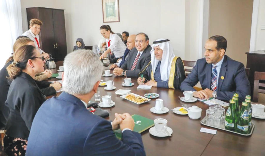 Dr. Abdullah Al-Rabeeah, general supervisor of the King Salman Humanitarian Aid and Relief Center (KSRelief), meets with members of the Saudi-Polish Parliamentary Friendship Group in the Polish Parliament on Friday. (SPA)