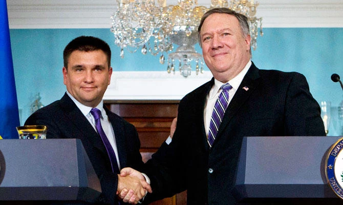Secretary of State Mike Pompeo shake hands with Ukrainian Foreign Minister Pavlo Klimkin after speaking to the media at the Department of State Friday, Nov. 16, 2018, in Washington. (AP)