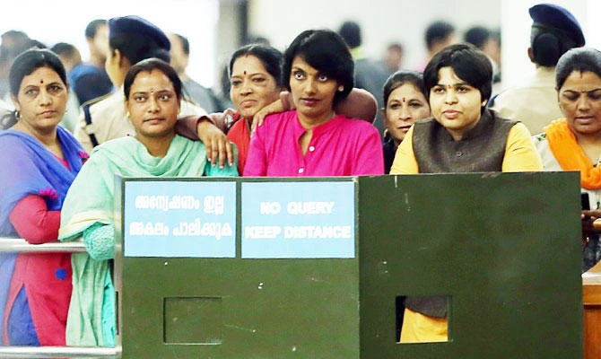 Indian airport protesters block woman activist’s plan to enter hill temple