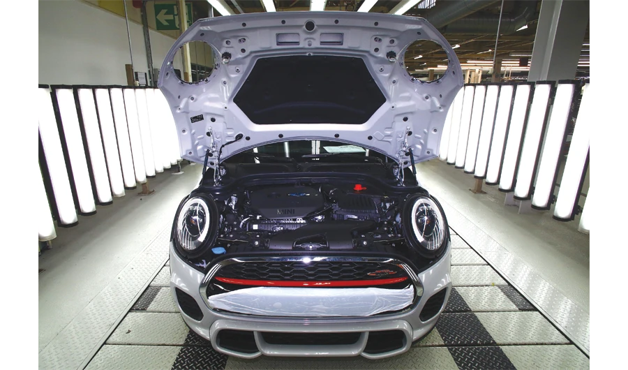 A Mini on the assembly line in Oxford, UK. Car-sector companies are shaking up manufacturing processes because of fears that Brexit will make trade harder. (AFP)