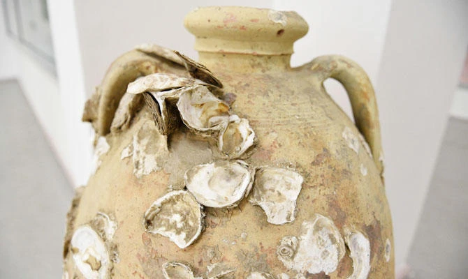An amphora from the 4th century BC and found underwater in Butrint is displayed at Albania's National Archeological Museum in Tirana on September 24, 2018. (AFP)